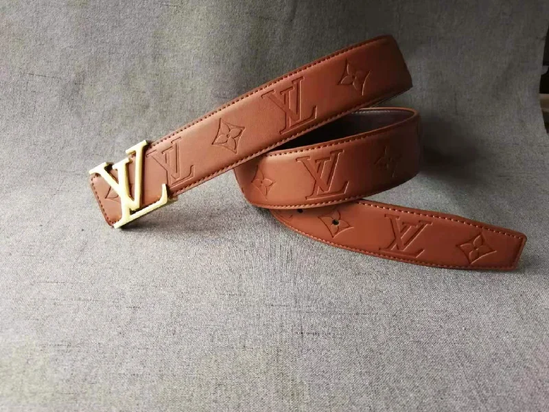 Tan belt gold buckle